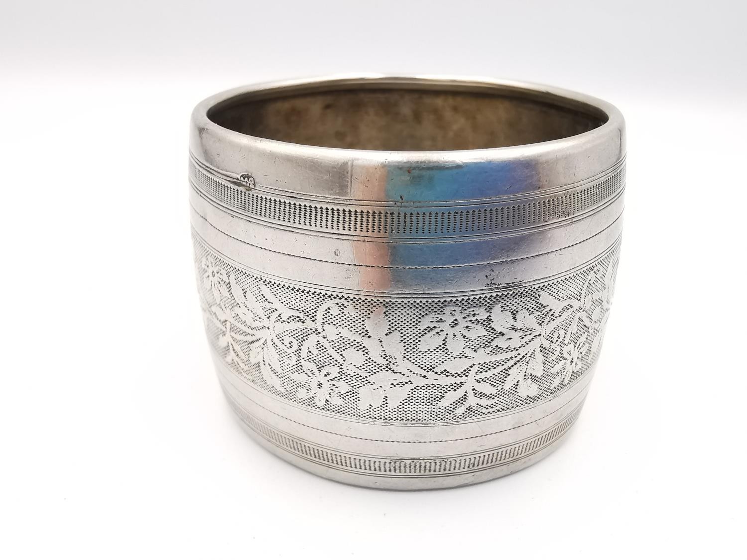 A collection of seven silver napkin rings, including an etched silver napkin ring by Gunther Theodor - Image 7 of 8