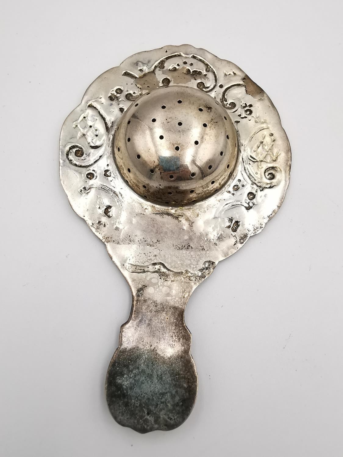 A collection of silver and white metal items, including a pair of sugar tongs with engraved - Image 14 of 16