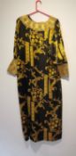 After Versace, a vintage black and gold silk Middle Eastern bespoke made robe with renaissance