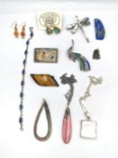 A collection of silver and gemstone jewellery, including a silver textured brooch set with