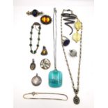 A collection of jewellery, including a Chinese silver gilt jade bead bracelet, a silver squiggle