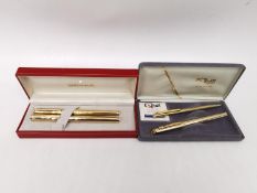 Two cased sets of vintage fountain pens, including a gold plated Schaeffer set with gold plated nibs