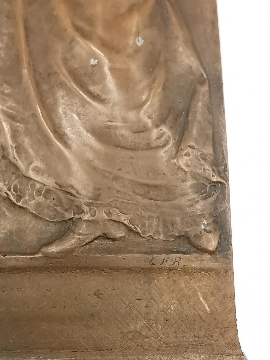 An Art Nouveau bronze relief plaque of a lady in flowing dress holding a magic lantern among blossom - Image 5 of 5