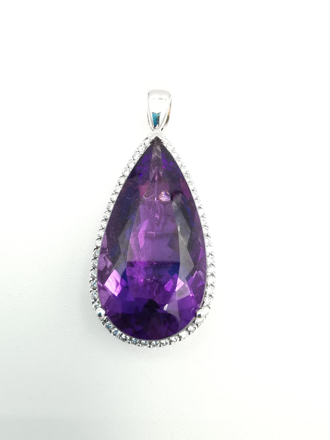 A contemporary 18ct white gold amethyst and diamond statement drop pendant. The pendant set with a - Image 7 of 7