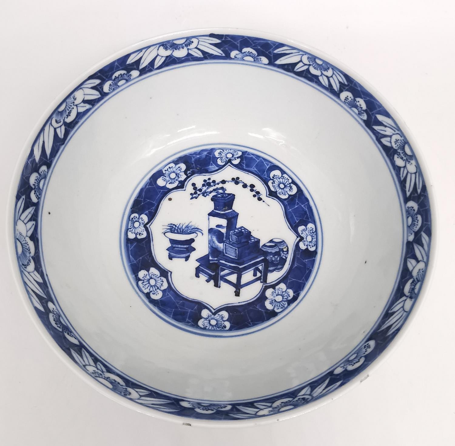 A 19th century Chinese blue and white porcelain footed large bowl with hand painted precious objects