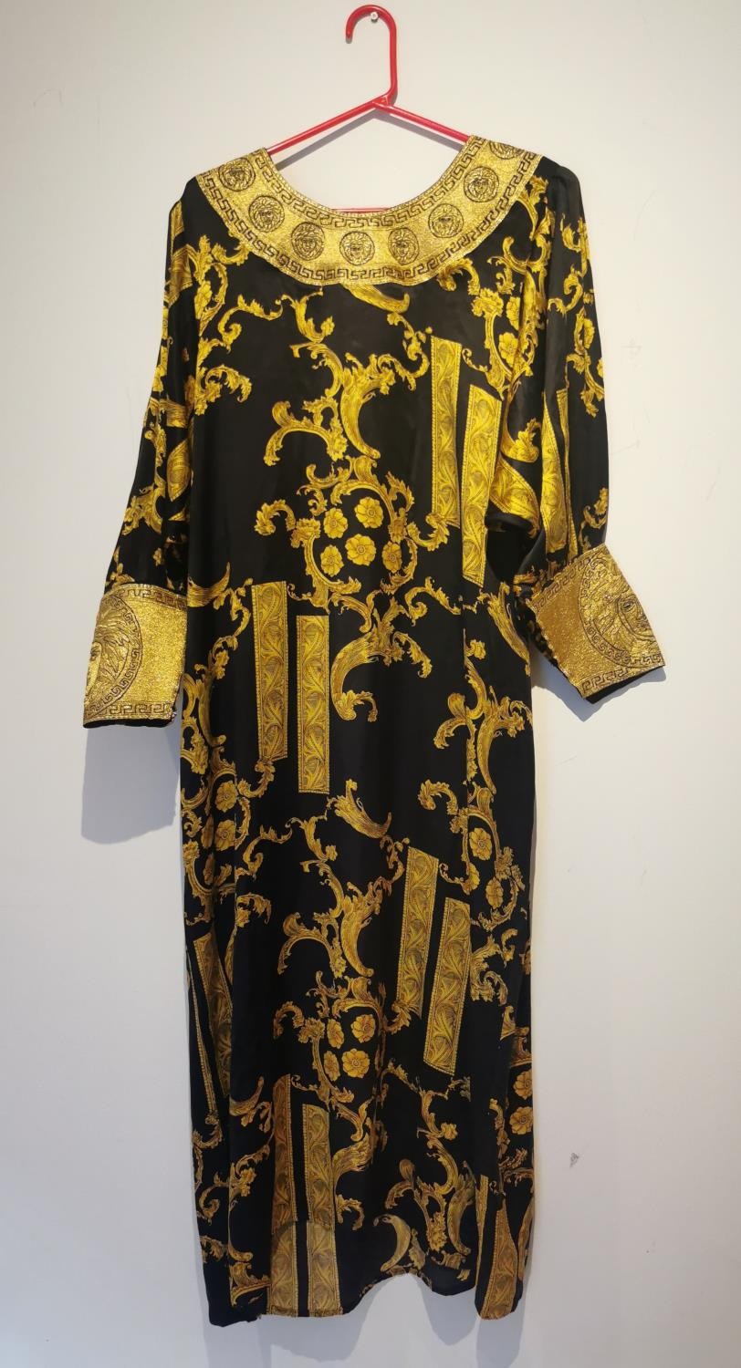 After Versace, a vintage black and gold silk Middle Eastern bespoke made robe with renaissance - Image 5 of 6