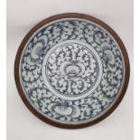 A 19th century Batavia Chinese ceramic basin with hand painted stylised lotus flowers and