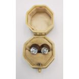 A pair of Victorian yellow metal (tests as 9ct gold) and cut paste shirt studs in an Art Deco