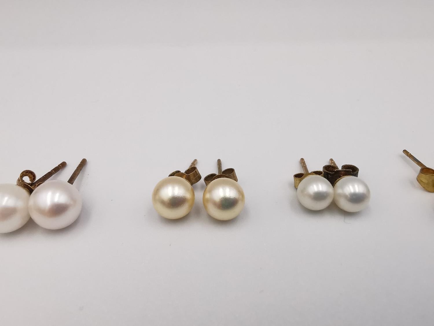 Four pairs of round cultured pearl stud earrings, three pairs with 9ct posts and butterflies. One - Image 3 of 7