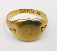 A Victorian 18ct yellow gold shield shape signet ring with engraved detailing to the shoulders