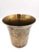A French white metal (tests as silver) engraved beaker by Pierre Fourneret. The chamfered design cup