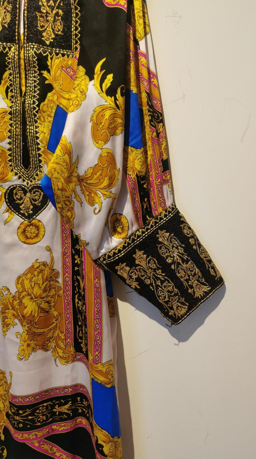 After Versace, a vintage royal blue, gold and white silk Middle Eastern bespoke made robe with - Image 2 of 6