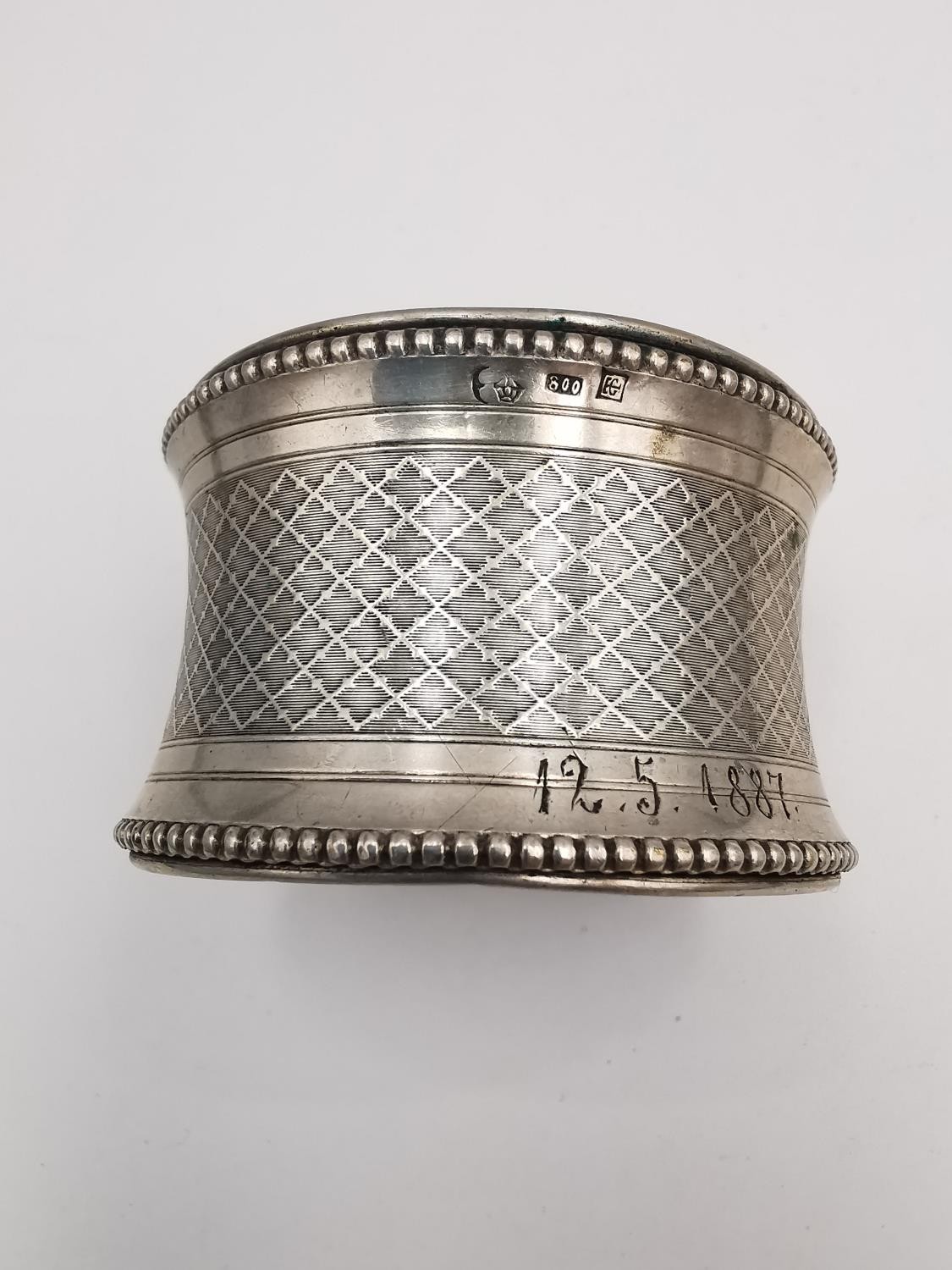 A collection of seven silver napkin rings, including an etched silver napkin ring by Gunther Theodor - Image 3 of 8