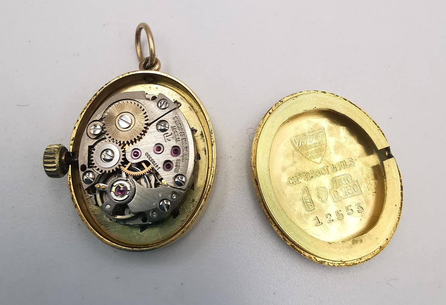 A Tissot 18ct yellow gold automatic ladies pendant watch with hanging loop. Oval face with gilt - Image 2 of 3