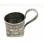 An antique 19th century Russian silver trompe l'oeil tea cup holder by Ivanov Vasily Ivanovic.