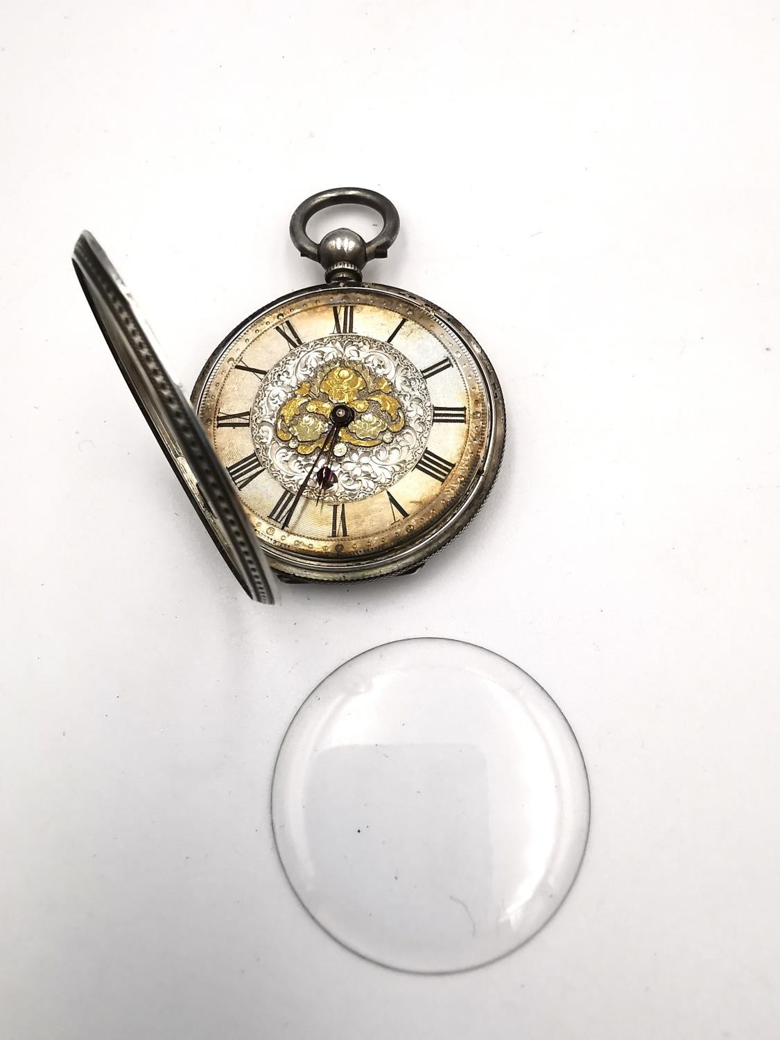 A 19th century Swiss fine silver ladies pocket watch with carved silver and gold foliate and - Image 6 of 7