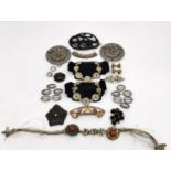 A collection of antique hair pieces and buckles and buttons, including a silver filigree hair