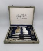 A cased set of German 835 silver cutlery for six people. Each piece stamped 835. Manufacturer's name