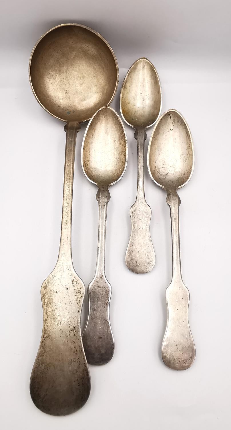 A large 19th century Austrian silver ladle and three matching serving spoons. Hallmarked with