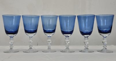 A set of William Yeoward crystal Fanny Blue goblets, with clear glass stems. H.20cm