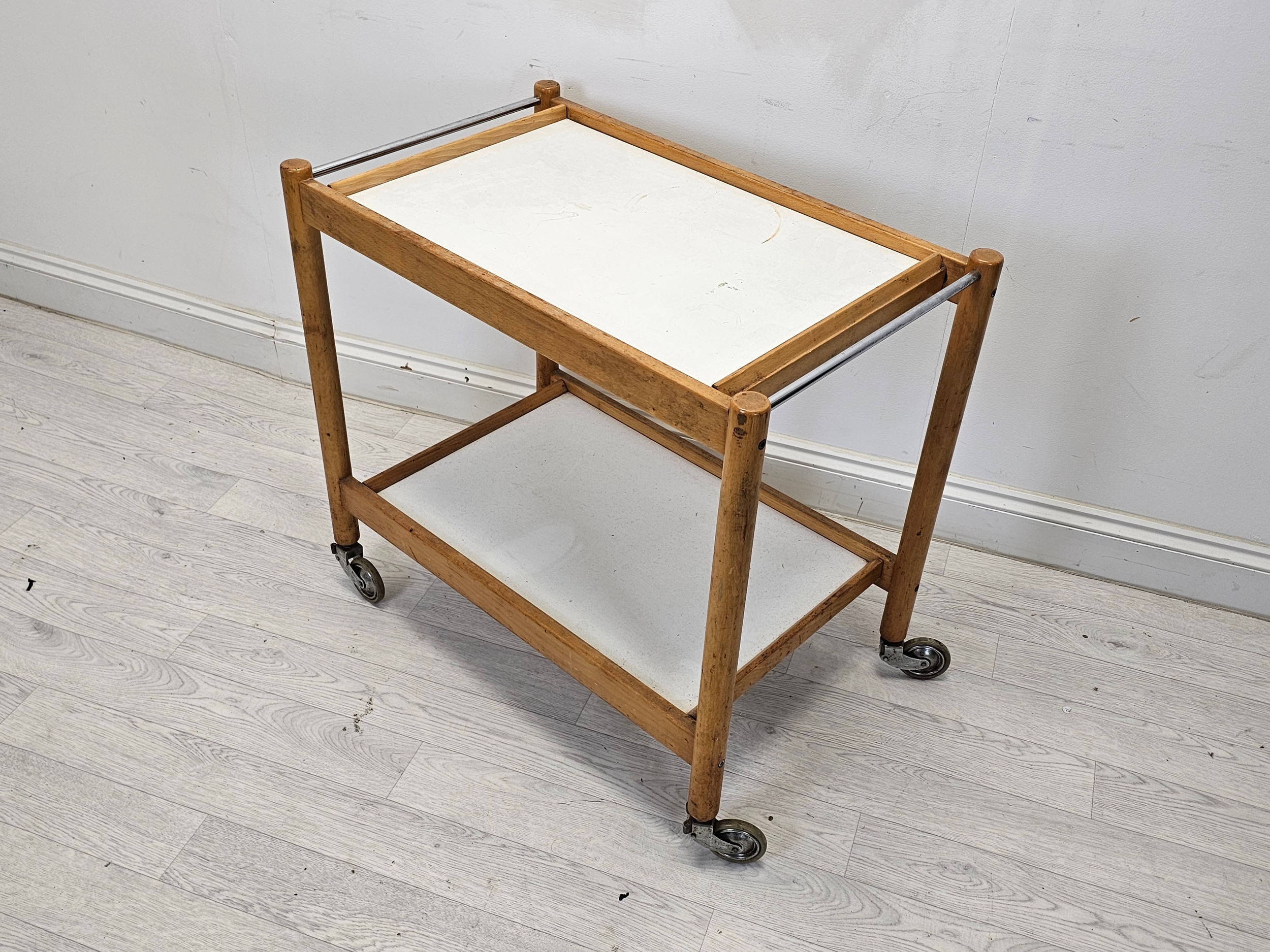 A vintage beech and composite laminated drinks or tea trolley. H.70 W.75 D.46cm. - Image 2 of 3