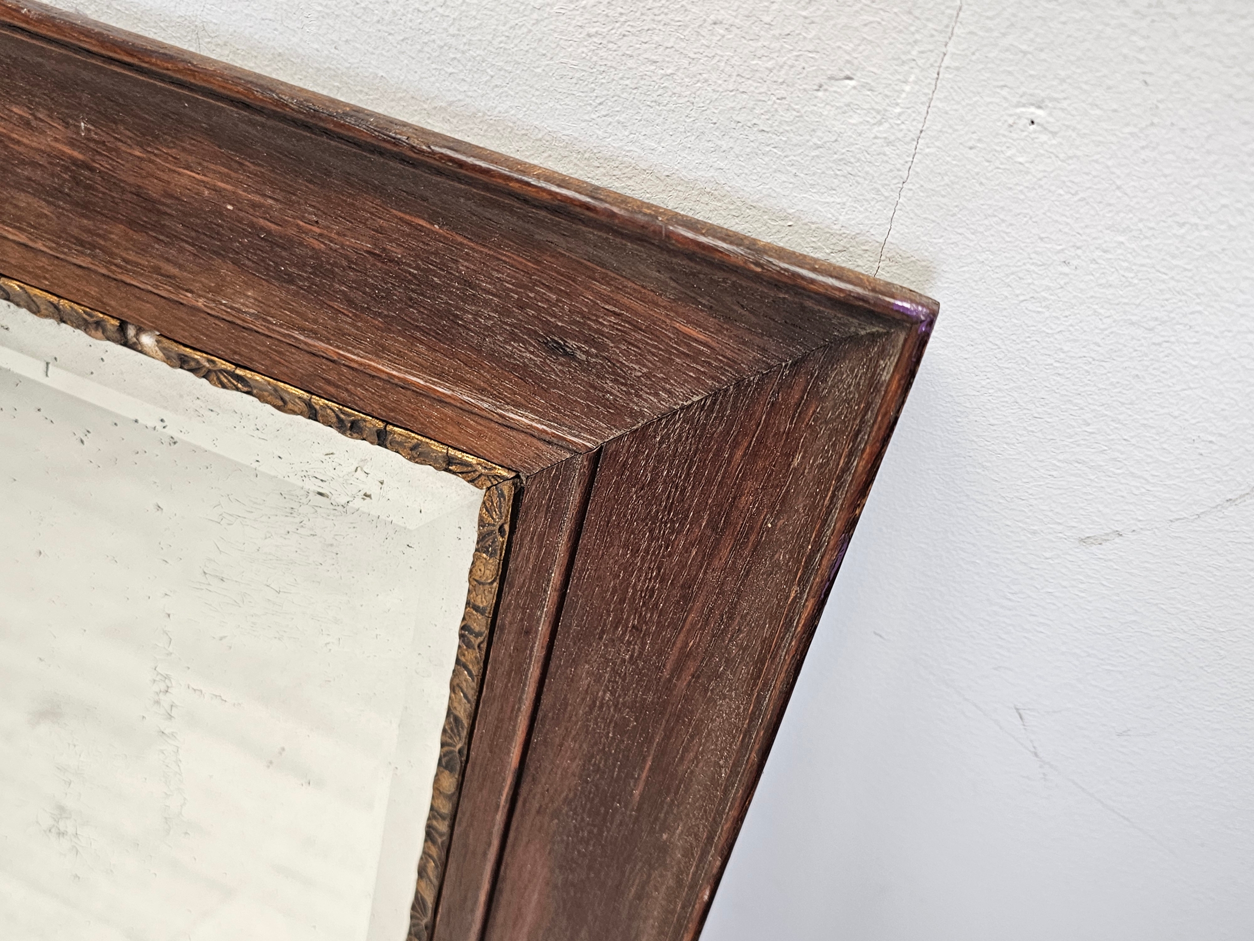 A vintage oak framed mirror with bevelled plate. H.66 W.56cm. - Image 2 of 3