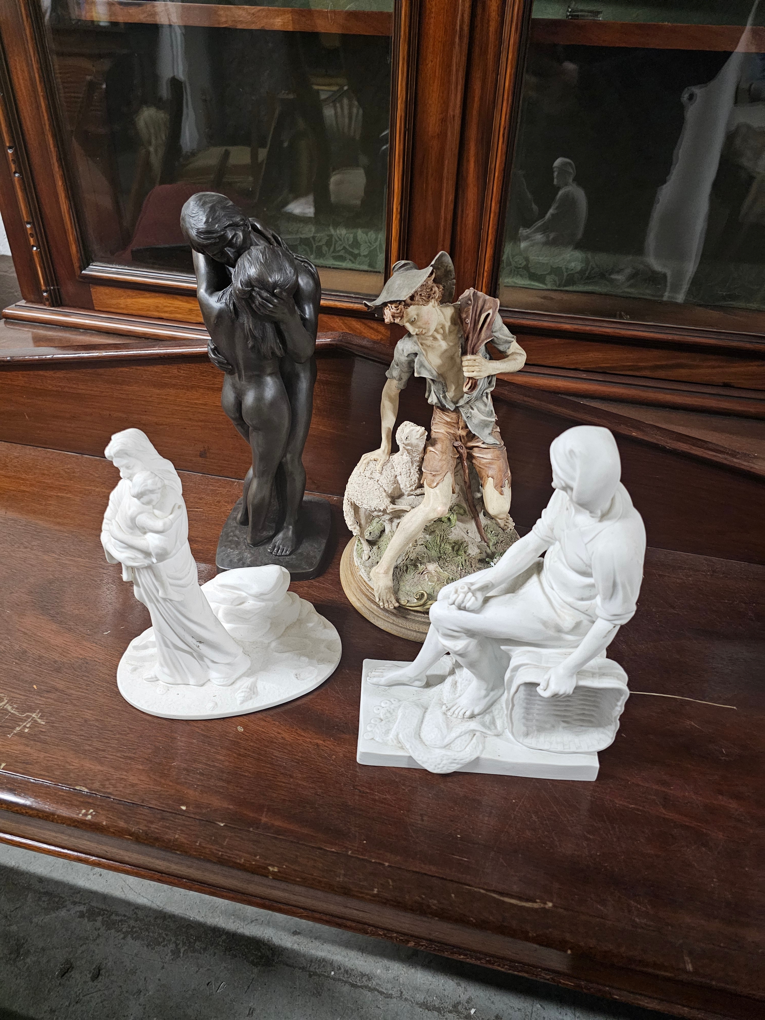 A collection of modern figures including Capodimonte and Parianware. Tallest is 34cm.