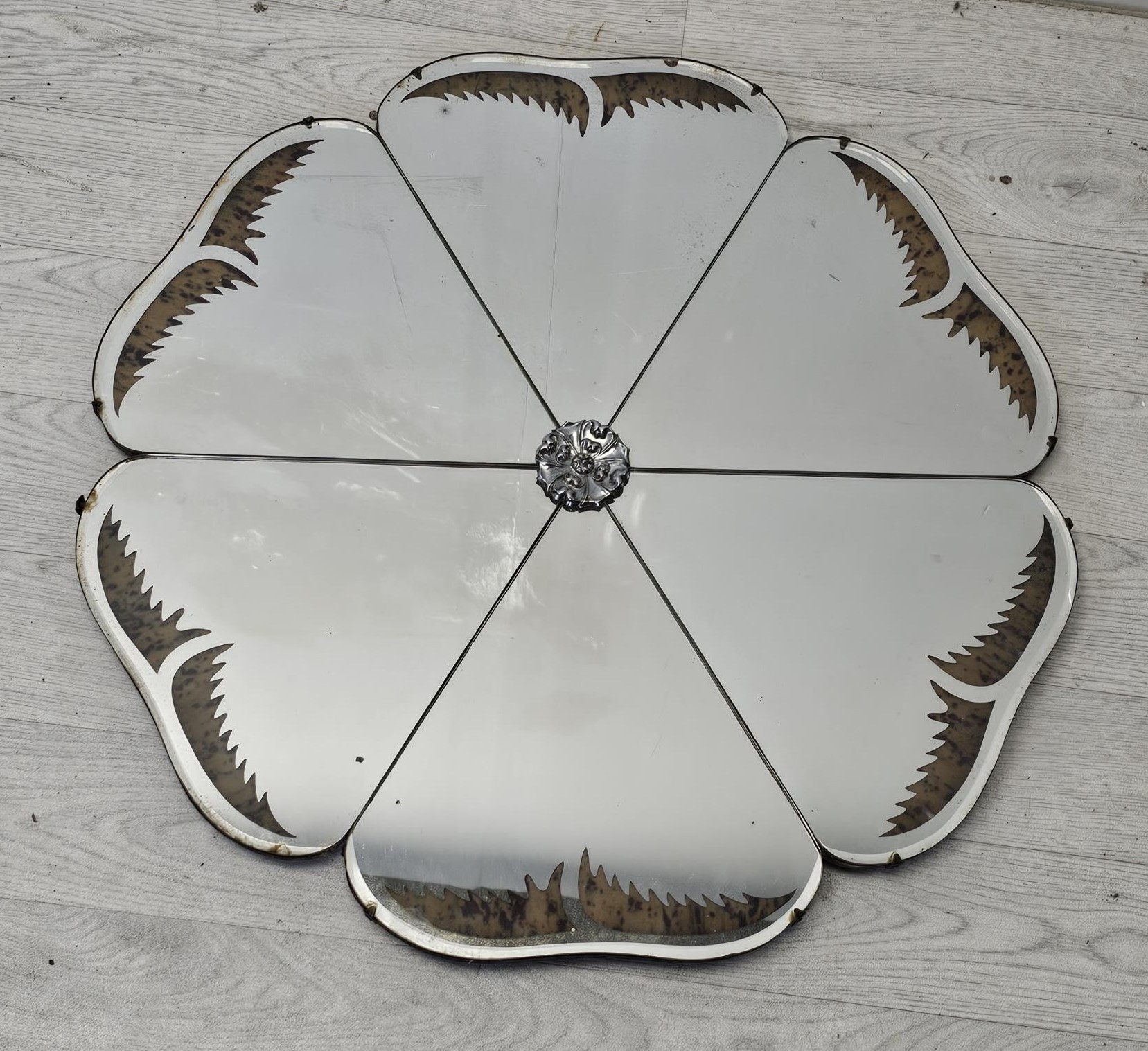 Art Deco wall mirror, vintage of flowerhead form with faux tortoiseshell inlaid decoration. H.65 W.