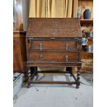Bureau, mid century oak Jacobean style. H.104 W.75 D.44cm.