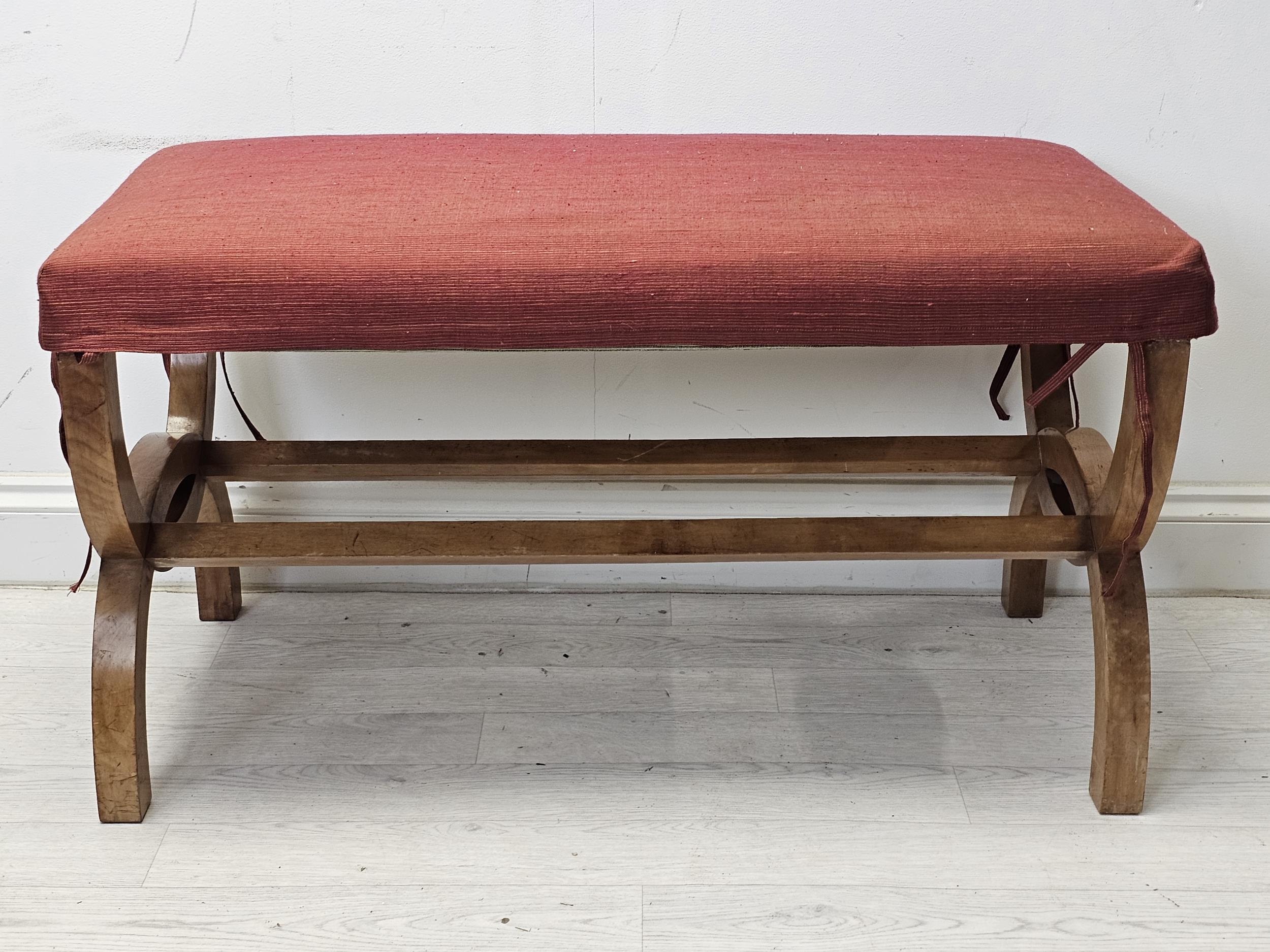 Long stool, 19th century Continental walnut on X frame. H.50 W.89 D.45cm.