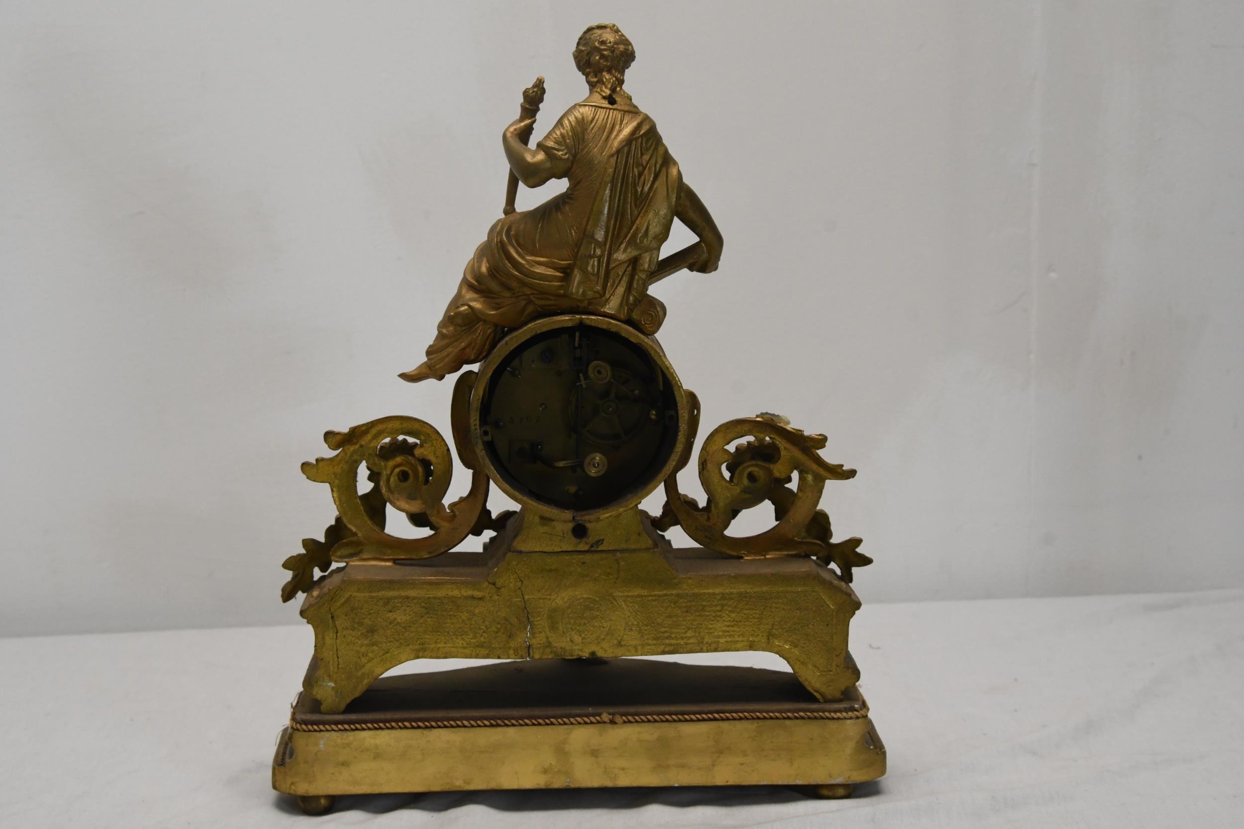 A French gilt metal figural clock with white enamelled dial. H.38 W.28 D.10cm. - Image 4 of 4