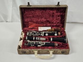 A cased Selmar clarinet.