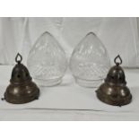 Two early 20th century bronze effect hanging ceiling lights with cut crystal acorn form shades. H.28