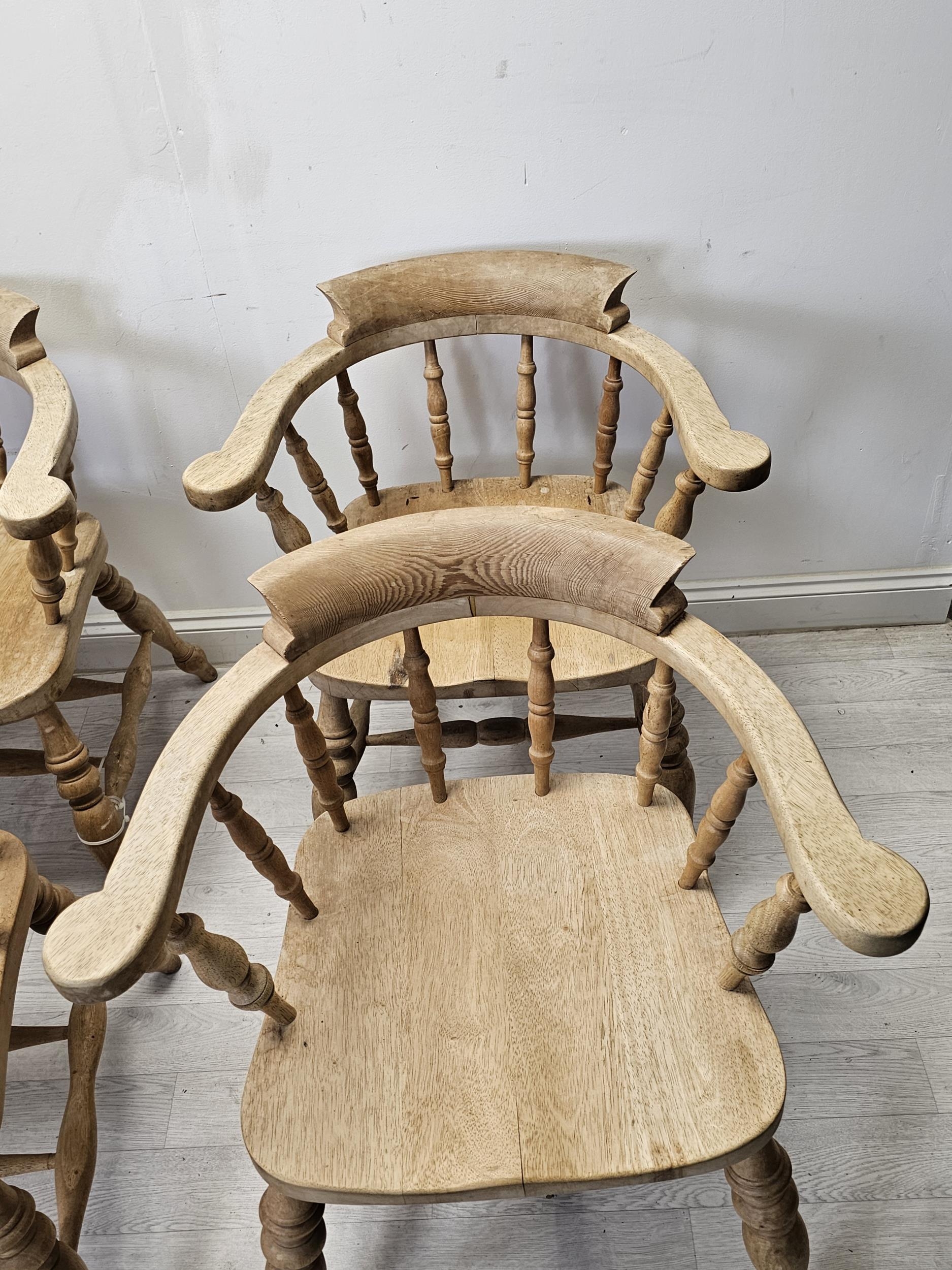 Bow back armchairs, a set of four C.1900 with saddle seats on turned stretchered supports. H.80 W.68 - Image 2 of 4