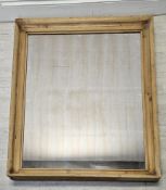 Wall mirror, C.1900, pine frame with original plate. H.145 W.108cm.