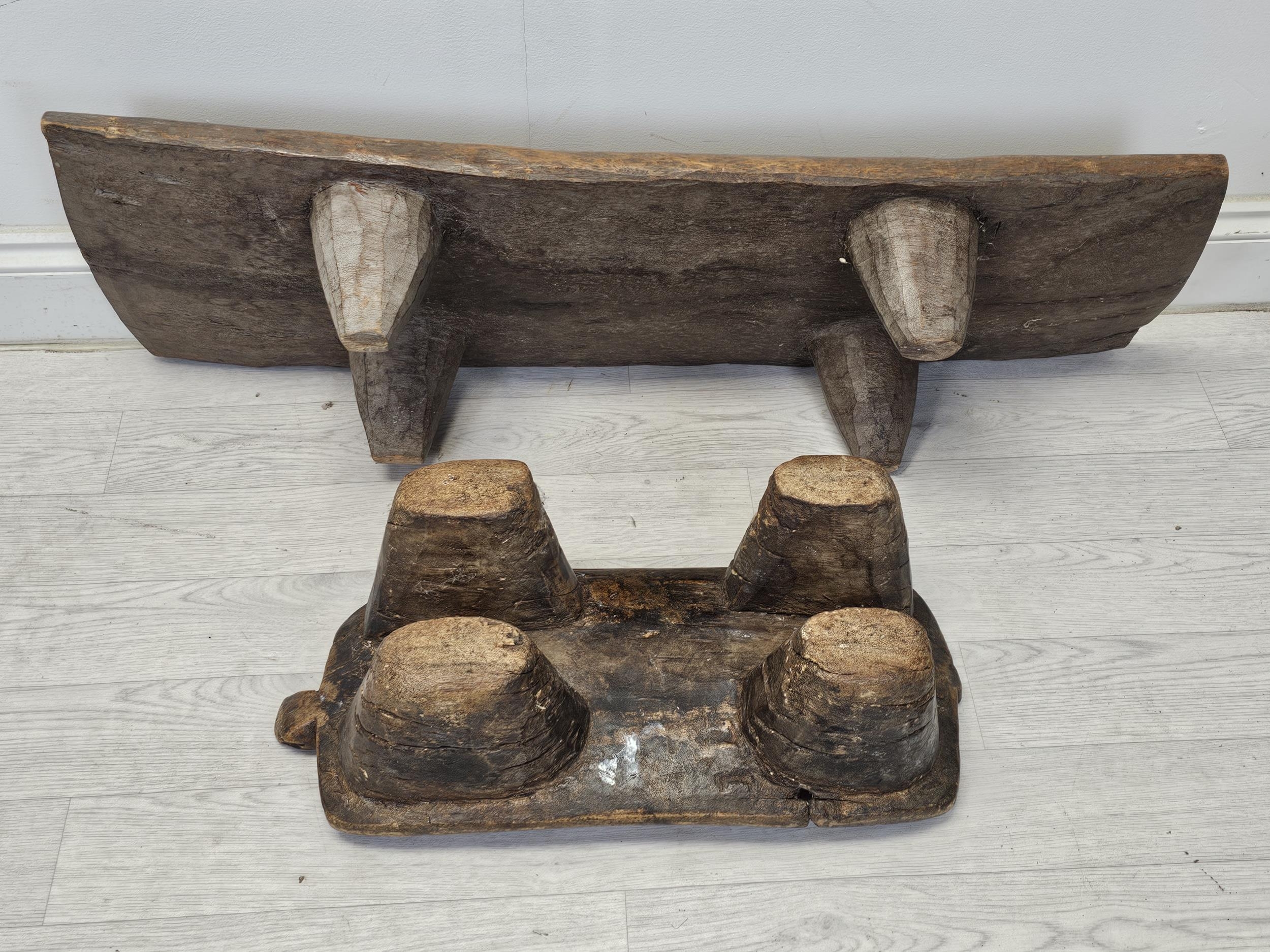 A 19th century African hardwood low stool along with a head rest. Possibly Senufo. Largest is W. - Image 2 of 4