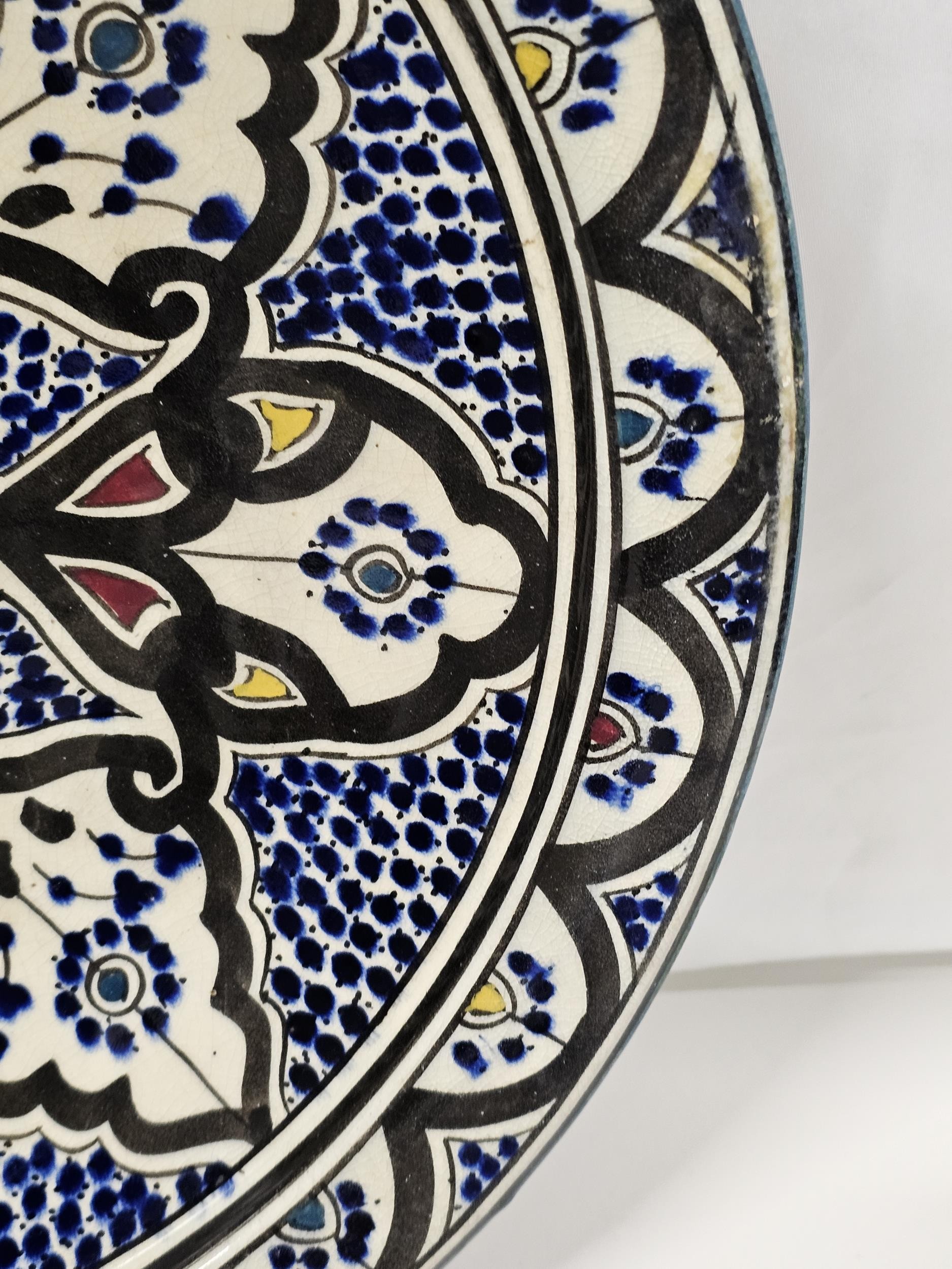 Two Moroccan hand painted bowl with stylised floral design. W.41cm. - Image 3 of 5