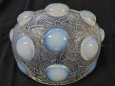 René Lalique, Art Deco opalescent glass wall sconce with 'Soleil' pattern, decorated with relief