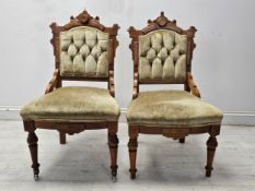 Salon chairs, a pair, late 19th century walnut in deep buttoned velvet upholstery. H.94 W.52 D.55cm.