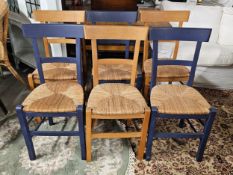A set of six contemporary dining chairs in an antique style, painted and with woven seats. H.90 W.42