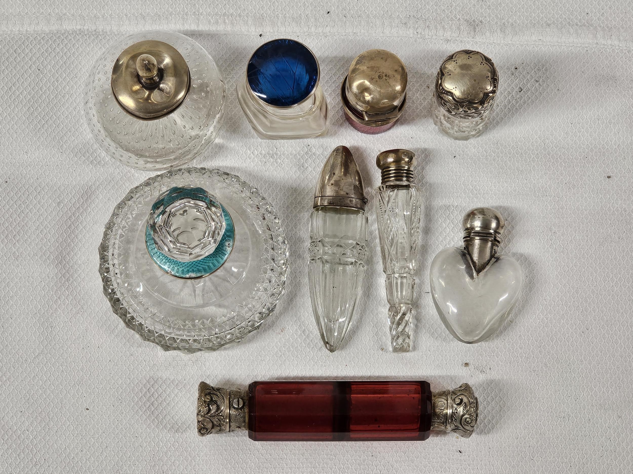 A collection of nine 19th century and early 20th century silver and white metal topped and perfume - Image 2 of 4