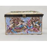 A 20th century Naples Capodimonte rectangular hand painted ceramic lidded box, moulded in low relief