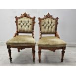 Salon chairs, a pair, late 19th century walnut in deep buttoned velvet upholstery. H.94 W.52 D.55cm.