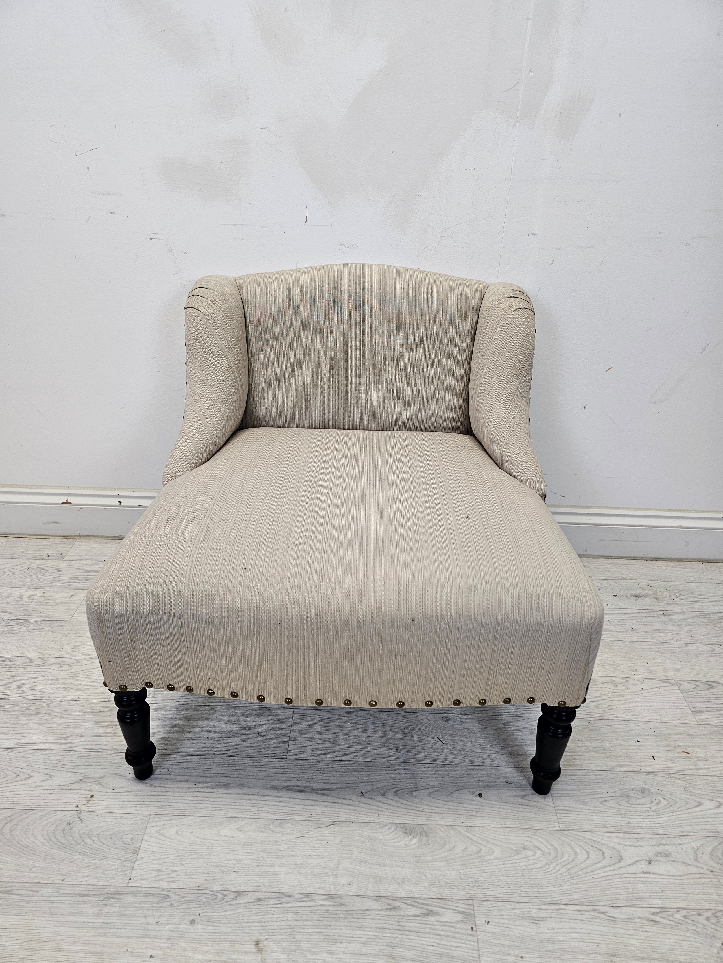 A small contemporary upholstered nursing chair in 19th century style. H.65 W.62 D.65cm.