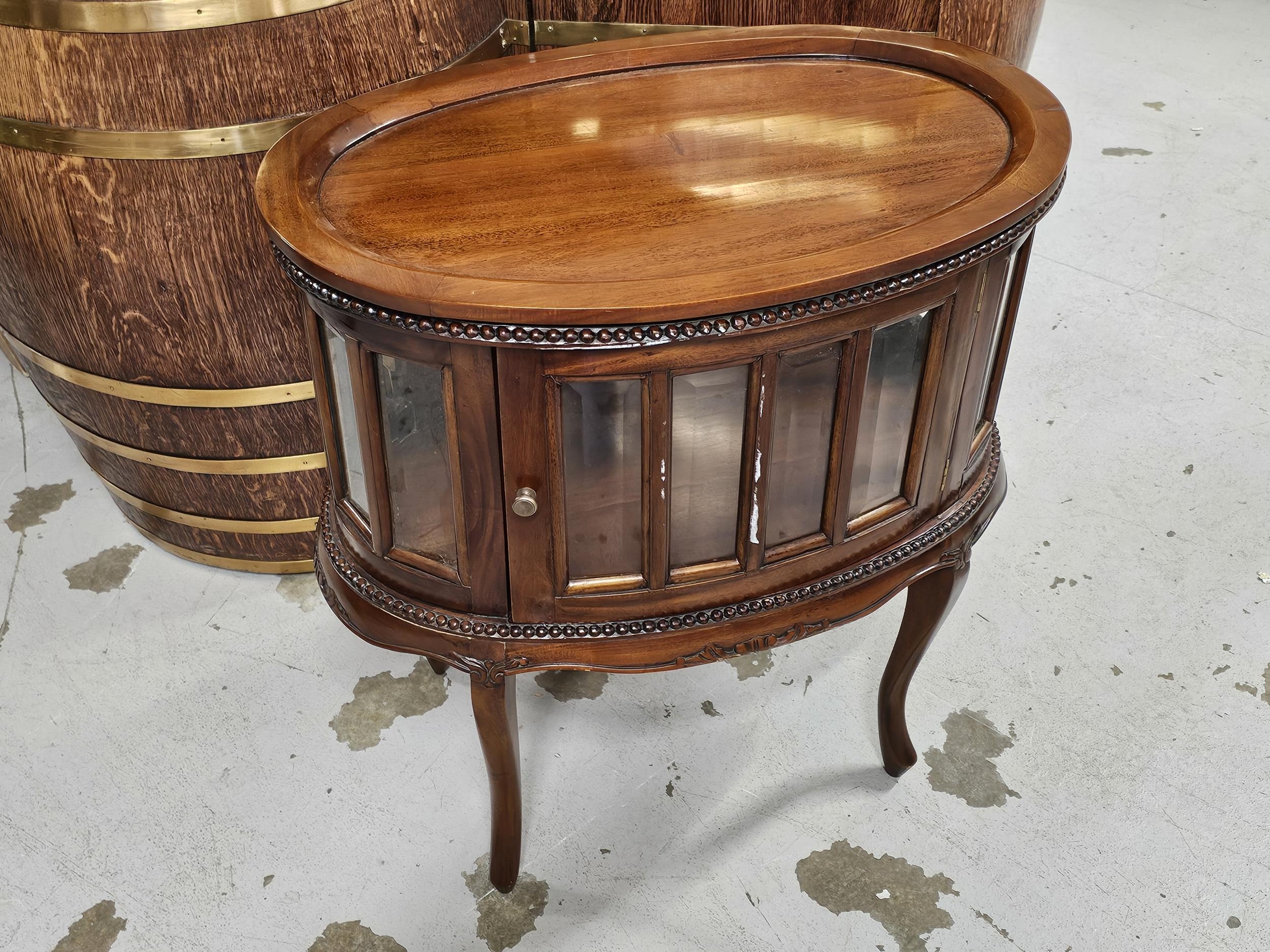 A 19th century style teak drinks or display cabinet fitted with a removable tray top. H.77 W.73cm. - Image 2 of 7