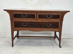 An Edwardian mahogany and satinwood chest of drawers. H.78 W.112 D.57cm. (Previously with fitted