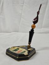 An Art Deco Crown Devon, gilt and abstract design pen stand with twist art glass dip pen. H.20cm.