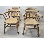 Bow back armchairs, a set of four C.1900 with saddle seats on turned stretchered supports. H.80 W.68