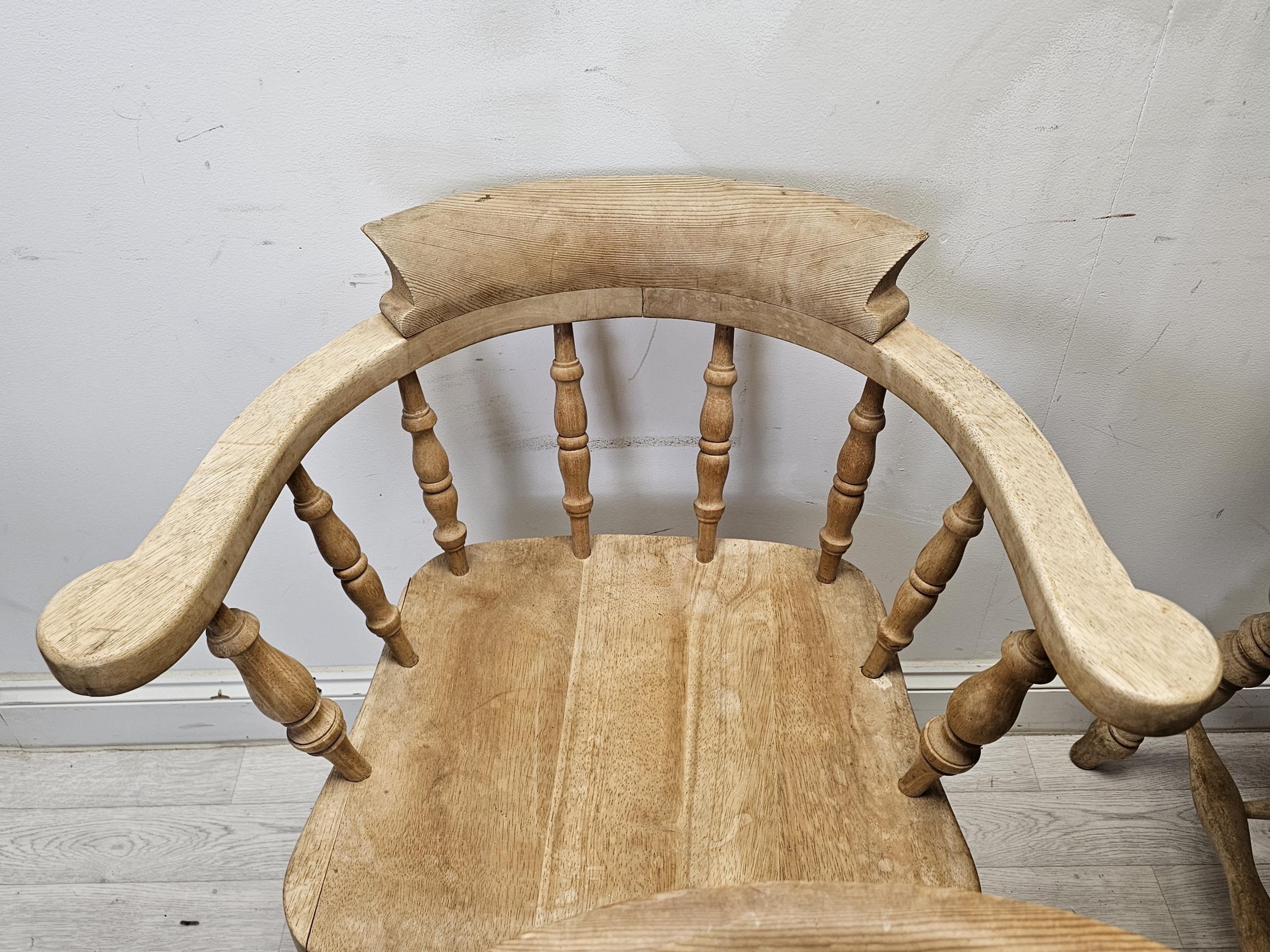 Bow back armchairs, a set of four C.1900 with saddle seats on turned stretchered supports. H.80 W.68 - Image 3 of 4