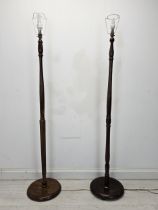 Two early 20th century turned standard lamps. H.172cm.